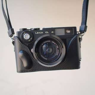 The auction is for a new Zhou black leather half case for Leica 