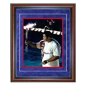 Autographed Muhammad Ali Picture   Framed Holding the Olympic Torch 