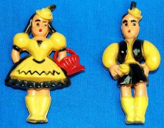 vintage Yellow plastic Dutch boy & girl Pins  