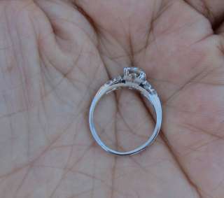 ring is platinum size 5 sizable and weighs 2 9g offer is for the ring 