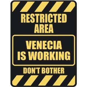   RESTRICTED AREA VENECIA IS WORKING  PARKING SIGN