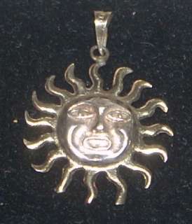   sun face aztec sun god pendant i learned via on line research that the