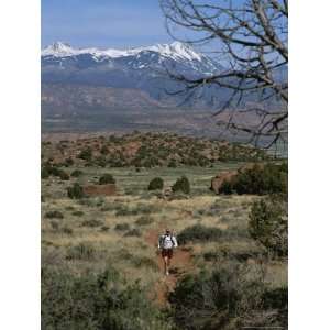  A Runner on the Hidden Valley Trail Above Moab, Utah 