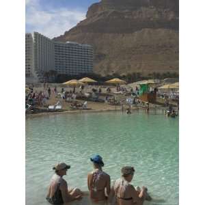  Three Women Sitting in the Sea and Hyatt Hotel and Desert 
