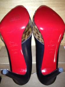 covered heel displays signature red sole leather insole made in 