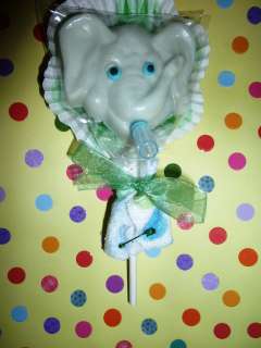 Homemade baby elephant lollipop in chocolate with diaper and baby 