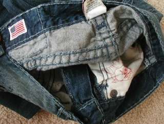   jeans in revolver. 100% cotton. blue stitches. Style# MQ2859H94