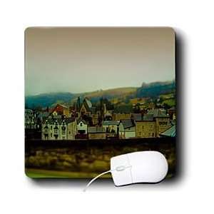   Behind a Block Wall Made to Look Like Miniature Buildings   Mouse Pads