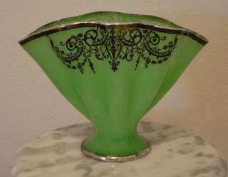   this is fenton s jade green 8 tall fan vase produced around 1933 it