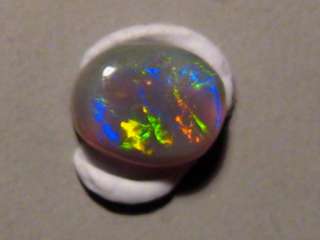 RED MULTI COLORED SOLID GEM AA BLACK OPAL  LOOSE  