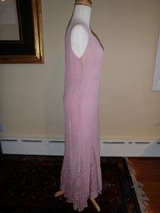 The dress appears to be in very nice condition given its age. It is 