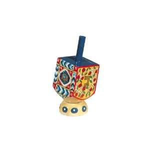   Small Wooden Dreidel with Floral and Geometric Designs and Stand