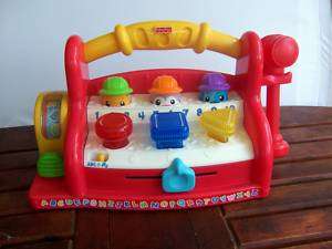 FISHER PRICE LAUGH & LEARN POP UP TOOL BENCH TOY 2004  