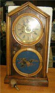 On offer is this very attractive wood cased Ingraham parlor clock .
