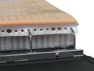 Pages are loaded through the side are locked in place with screws 