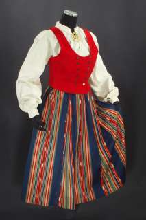   womans folk costume from Ilmajoki ikat skirt blouse brooch vest