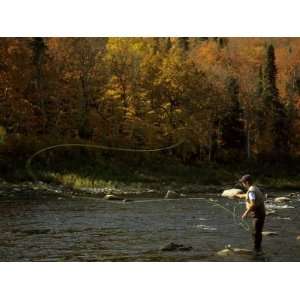 Fly Fisherman Lays Out a Perfect Cast in Search of Atlantic Salmon 